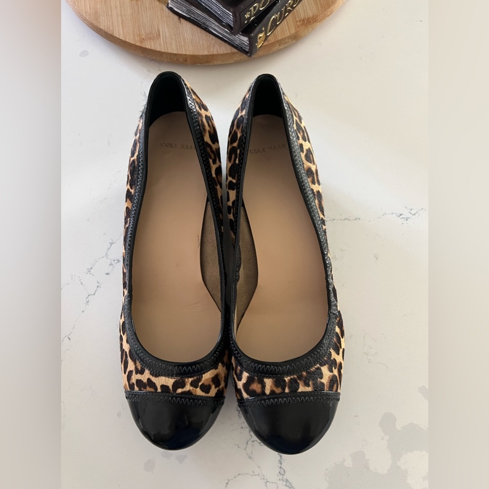 Cheetah print black wedges. Cole Hann size 10. True to size